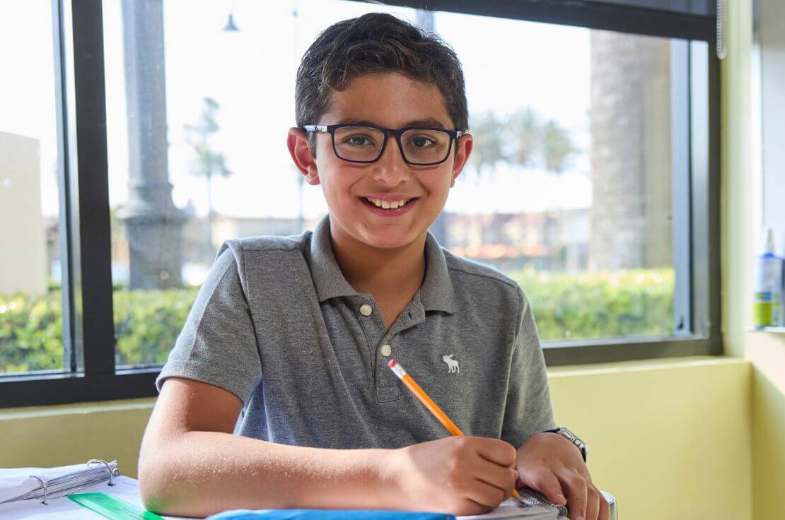 teacher and student in math classroom
