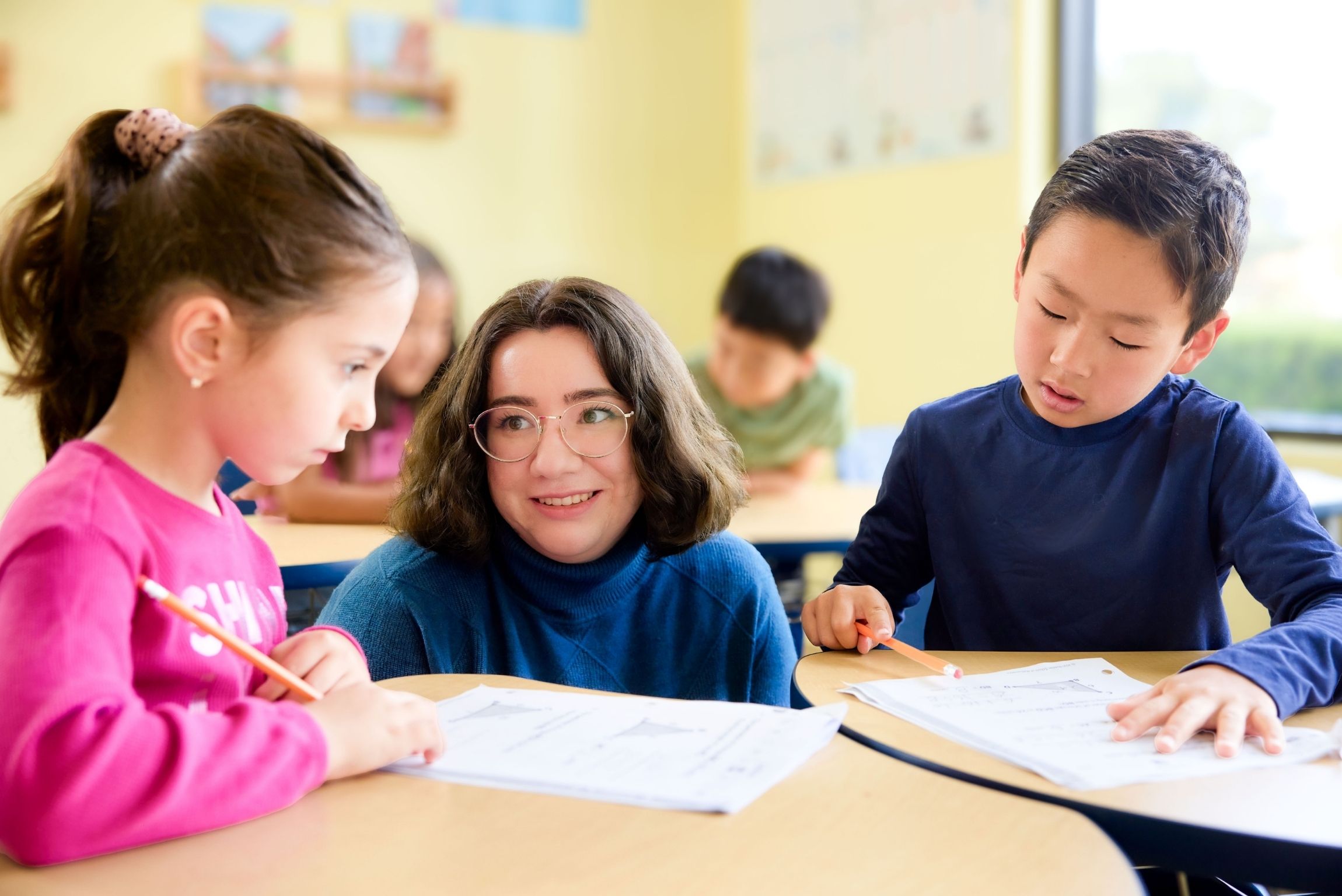 teacher with students at desks